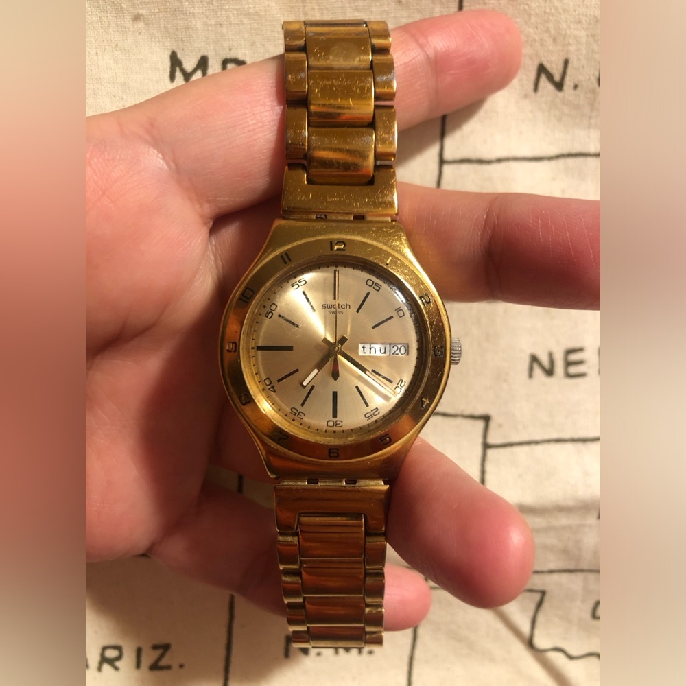 Swatch Unisex Gold-Tone Stainless Steel Watch - Gold
Swiss movement